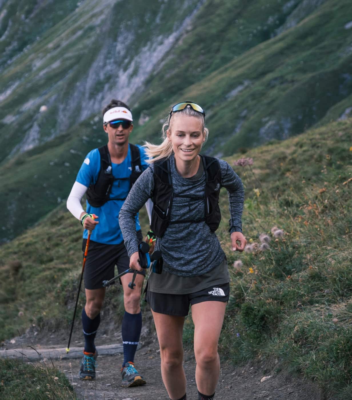 Harmony and Dylan Bowman running in the mountains at UTMB ultra trail running race.
