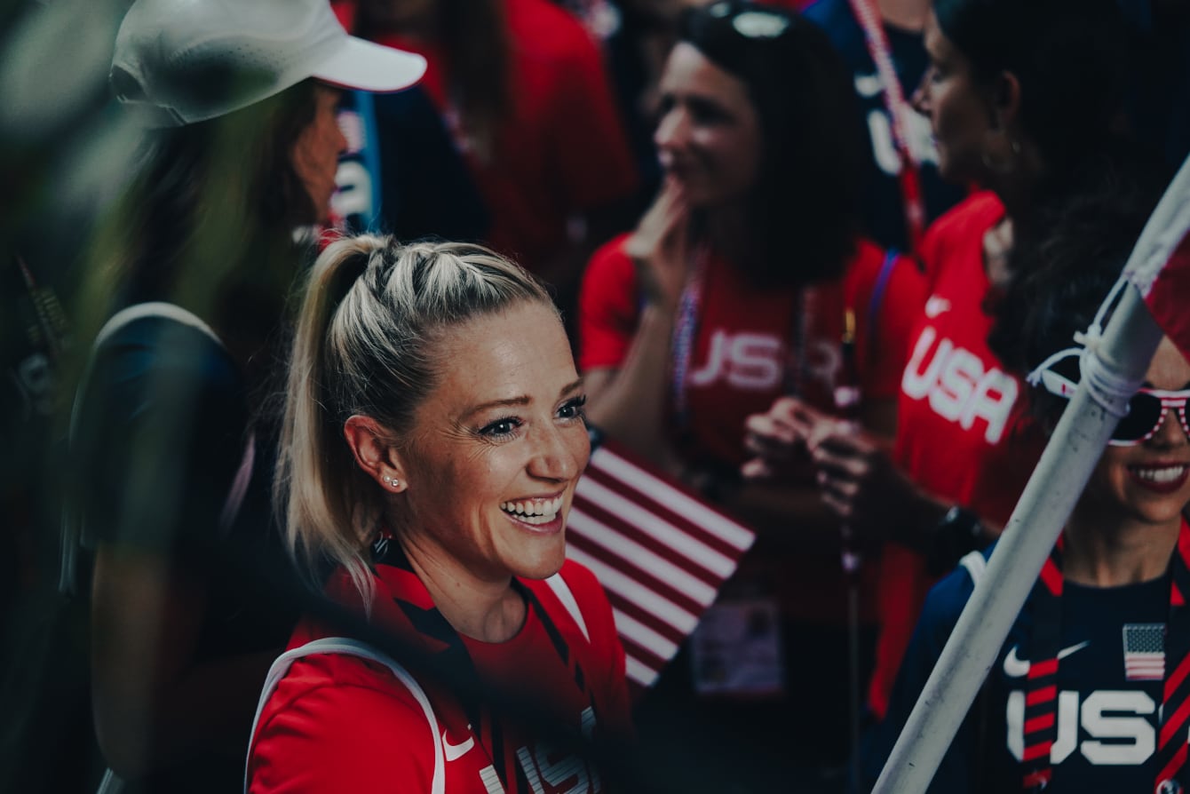 Brittney, the funny runner, as flag bearer during the parade of nations 