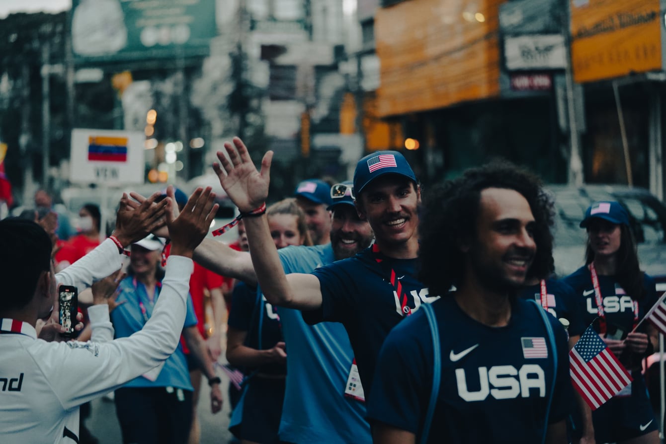 Team USA gives high fives on the way into the ceremonies 