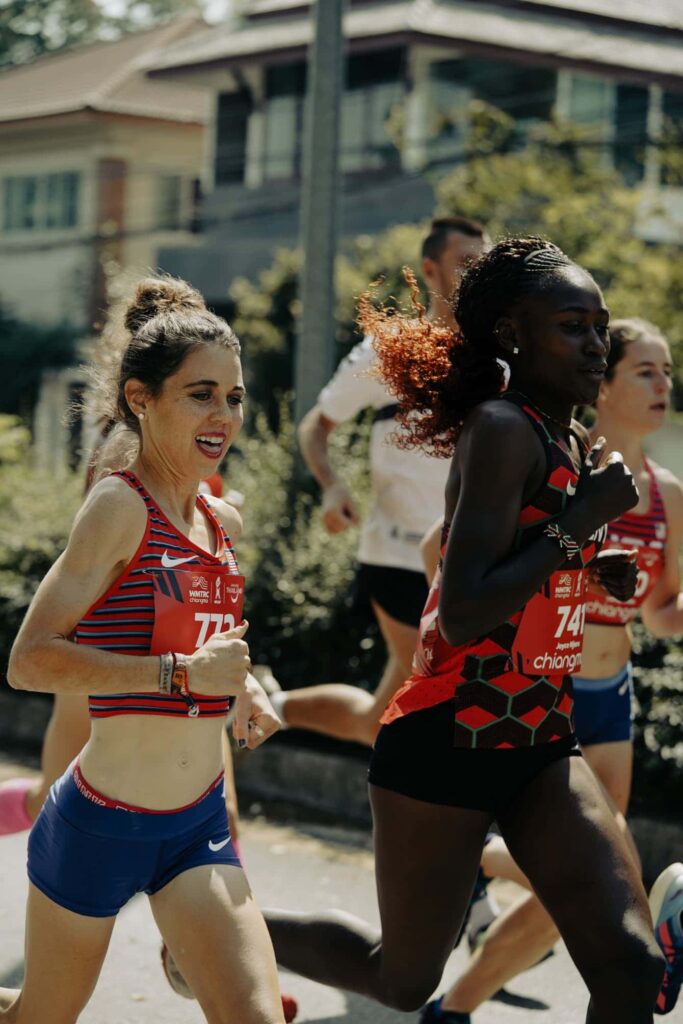 Allie Mac of team USA and Kenyan favorite Joyce run shoulder to shoulder from the start line