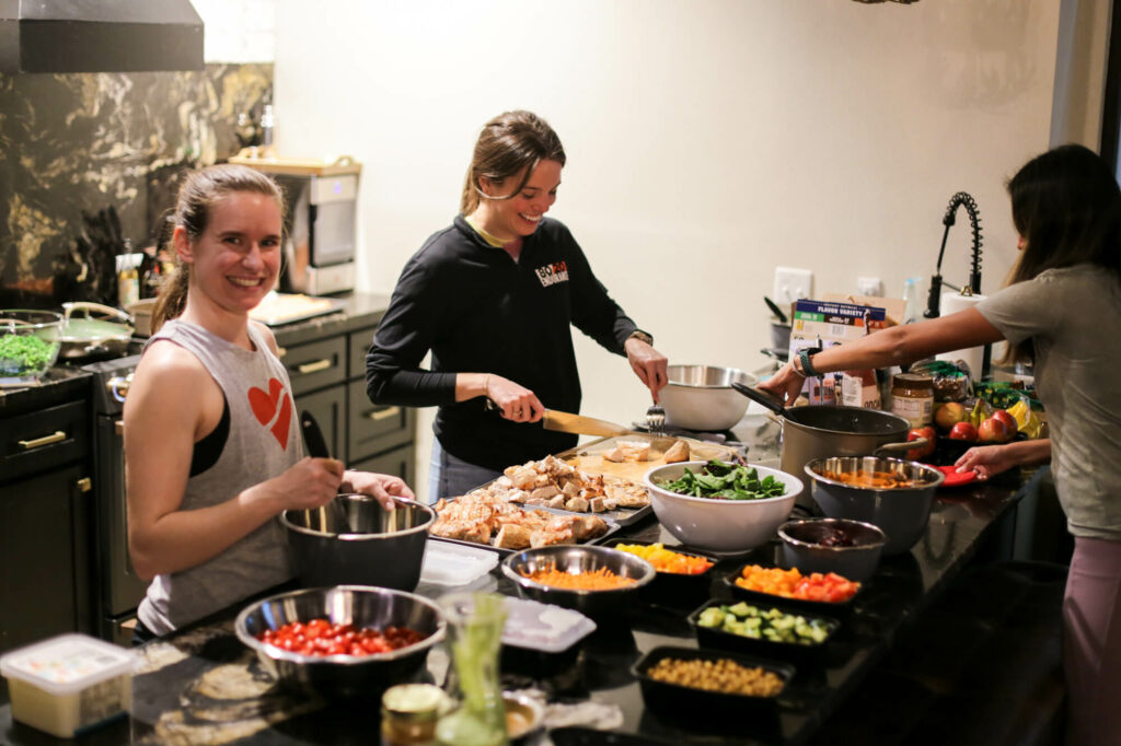 Preparing a healthy dinner spread for hungry runners. PC: Ruby Wyles