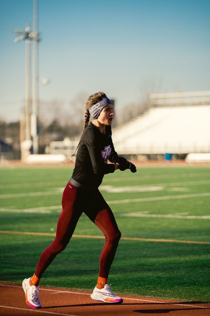 Athlete Ruby Wyles working on her speed and leg turnover on the track. PC: Kyle Lauff