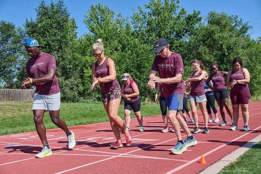 A run club hits the track for a training session. PC: Ruby Wyles