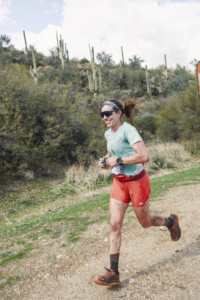 Becca Windell on her way up through the field during Black Canyon 100km
